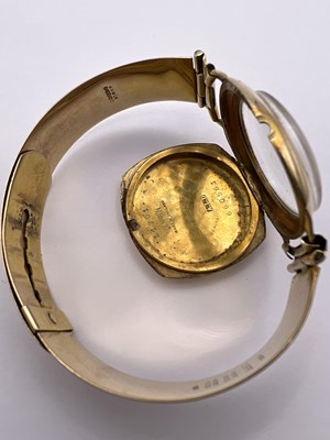 Lot 197 - A 9ct gold bracelet watch, the circular...