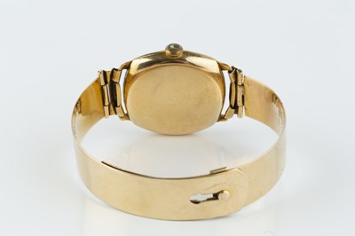 Lot 197 - A 9ct gold bracelet watch, the circular...