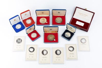 Lot 323 - A collection of silver proof coins, comprising...