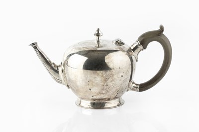 Lot 557 - A silver bachelor's teapot, of globular form...