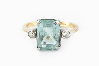 Lot 154 - An aquamarine and diamond three stone ring,...