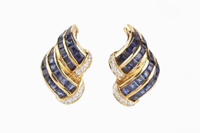 Lot 102 - A pair of sapphire and diamond earrings, each...