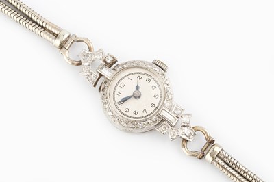 Lot 178 - A lady's diamond set cocktail watch, the...