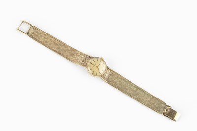 Lot 183 - A lady's 9ct gold bracelet watch by Omega, the...