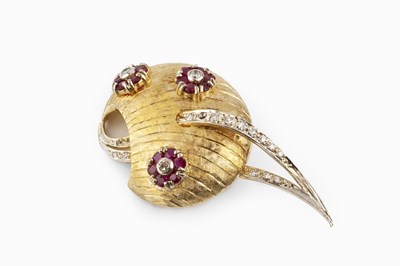 Lot 108 - A ruby and diamond panel brooch, of stylised...