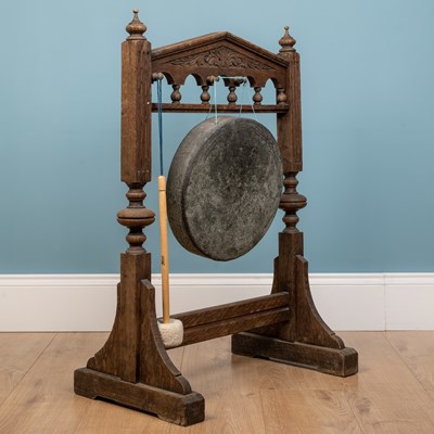 Lot 187 - A gong in a wooden frame, with mallet, 62 x 89cm