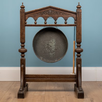 Lot 187 - A gong in a wooden frame, with mallet, 62 x 89cm