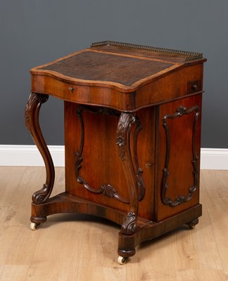 Lot 255 - An early Victorian rosewood Davenport desk,...