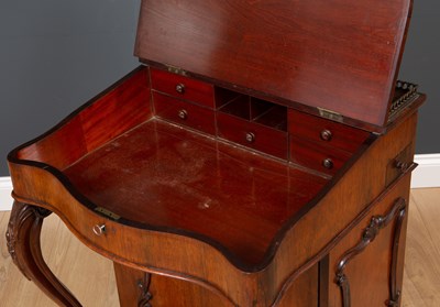 Lot 255 - An early Victorian rosewood Davenport desk,...