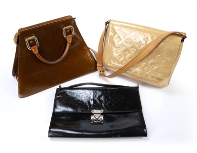 Lot 465 - Three Louis Vuitton handbags one a bronze...