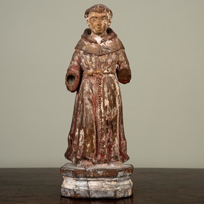 Lot 64 - A carved figure of a monk