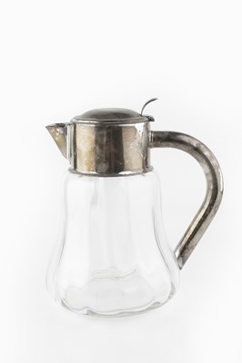 Lot 587 - An early 20th century lemonade jug, with...