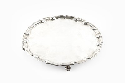 Lot 575 - A silver salver, with shaped piecrust border,...