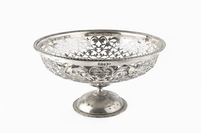 Lot 577 - A George V silver fruit bowl, with foliate and...