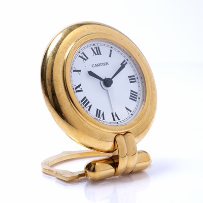 Lot 494 - Must De Cartier alarm clock, in gold-coloured...