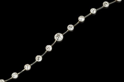 Lot 173 - A diamond line bracelet, designed as a series...