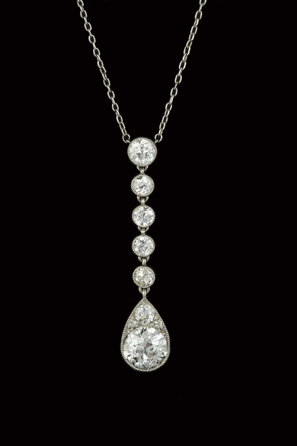 Lot 174 - A diamond pendant on chain, the pear-shaped...