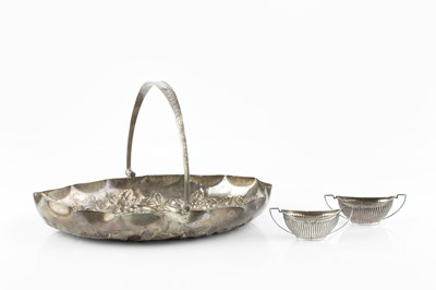 Lot 342 - An Edwardian silver swing handled oval cake...