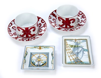 Lot 342 - Pair of Hermès porcelain teacups and...