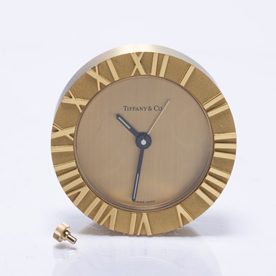 Lot 487 - Tiffany & Co 'Atlas' brass desk clock, the...