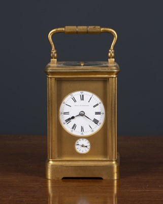 Lot 379 - A French carriage clock retailed by Paul...