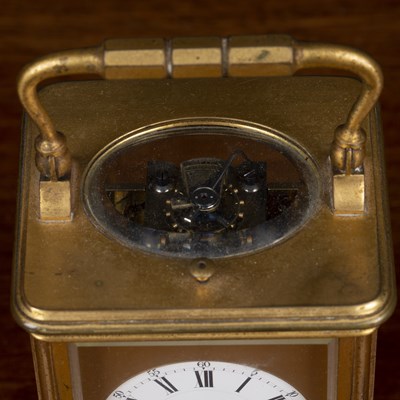 Lot 379 - A French carriage clock retailed by Paul...