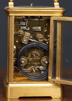 Lot 379 - A French carriage clock retailed by Paul...