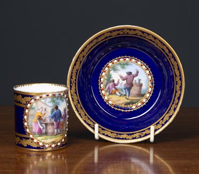 Lot 389 - A Sevres porcelain coffee can and saucer on a...