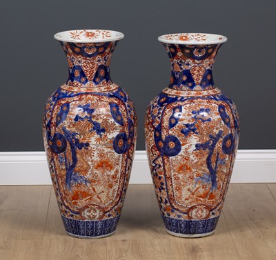 Lot 7 - A pair of large Imari porcelain vases...