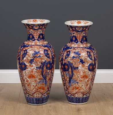 Lot 7 - A pair of large Imari porcelain vases...