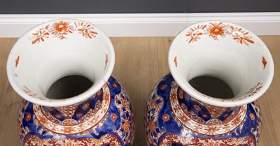 Lot 7 - A pair of large Imari porcelain vases...