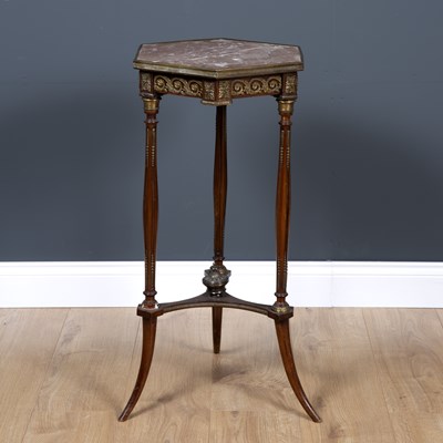 Lot 12 - A French marble topped and ormolu mounted...
