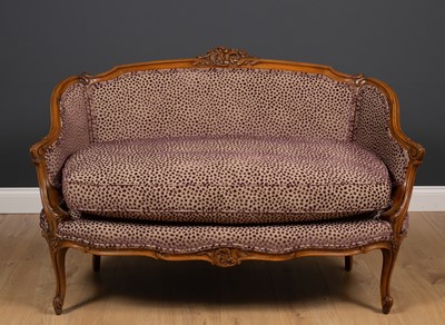 Lot 17 - An 18th century French style walnut small sofa...