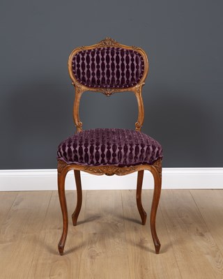 Lot 21 - An antique French side chair with carved...