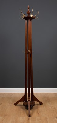 Lot 26 - An Edwardian walnut coat stand with turned...