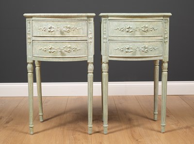 Lot 37 - A pair of bow fronted green painted bedside...