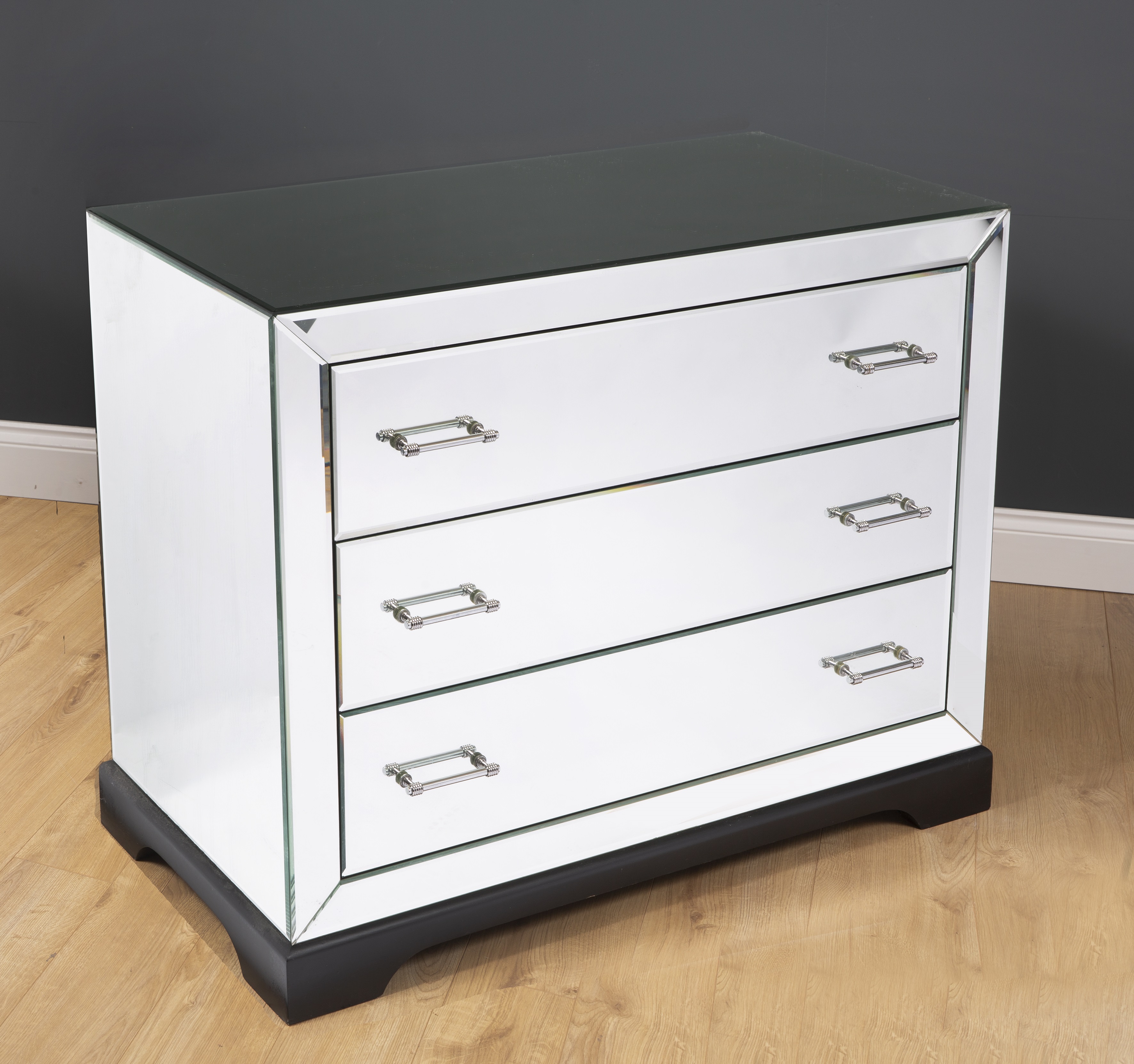 Lot 40 A contemporary mirrored three drawer chest