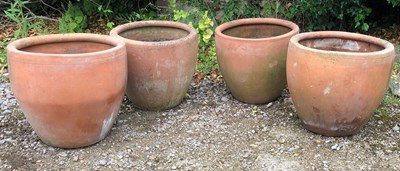 Lot 740 - A set of four terracotta flower pots, 50cm...