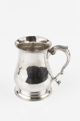 Lot 601 - A George II silver mug, of baluster form, with...