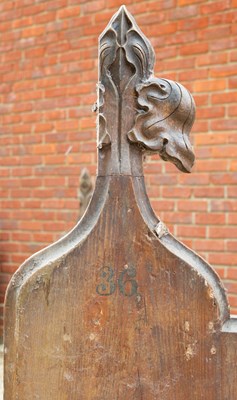 Lot 805 - A Victorian pine pew with carved finials to...