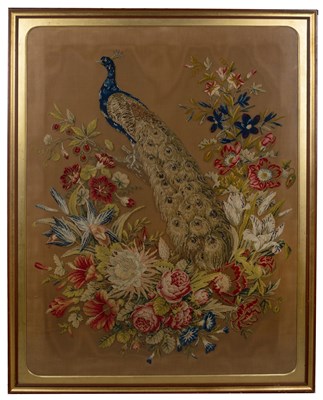 Lot 266 - A Berlin woolwork picture of a peacock amongst...