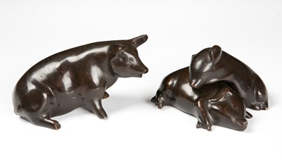 Lot 275 - A sculptural group of three bronze pigs the...