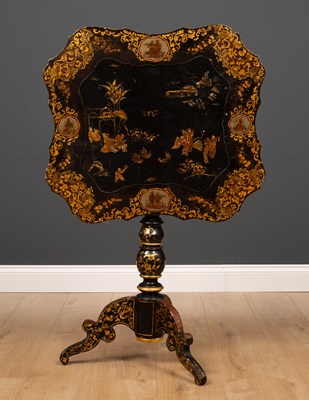 Lot 408 - A Regency ebonized tilt top tripod table, the...