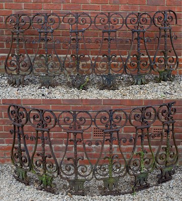 Lot 763 - A pair of wrought iron scrolling balustrade...