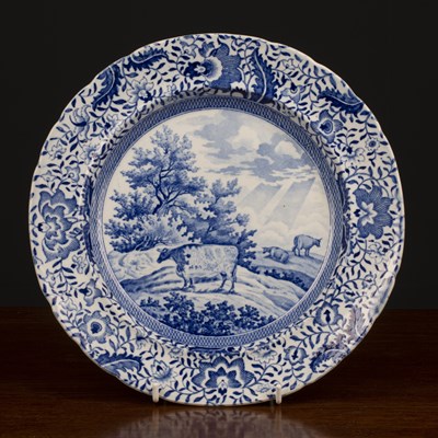 Lot 424 - An early 19th century blue and white plate...