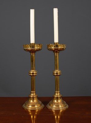 Lot 51 - A pair of Victorian turned brass candlesticks...