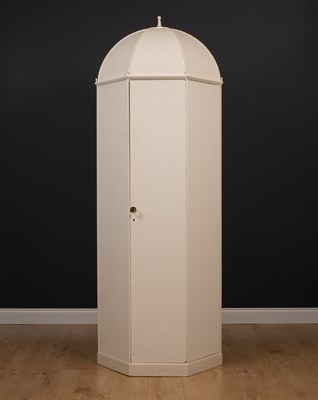 Lot 74 - A small octagonal white painted wardrobe in...