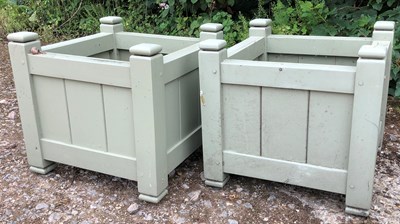 Lot 774 - A pair of green painted square wooden planters...