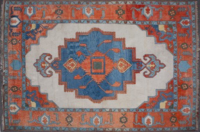 Lot 316 - A Turkish red, blue and cream ground woollen...