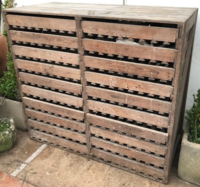 Lot 782 - An early 20th century pine apple rack with...